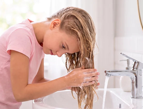 Washing temporary color from hair